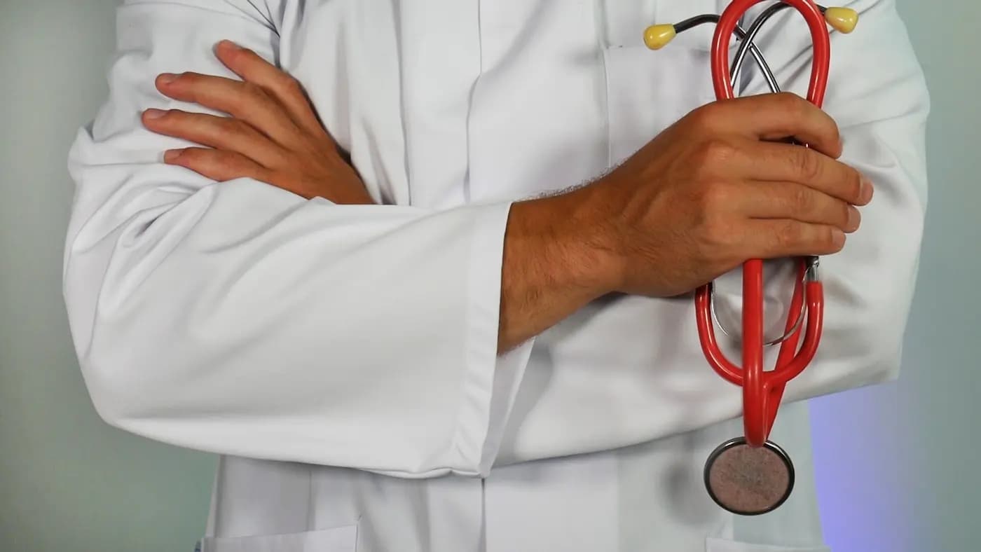 Healthcare professional supporting a patient